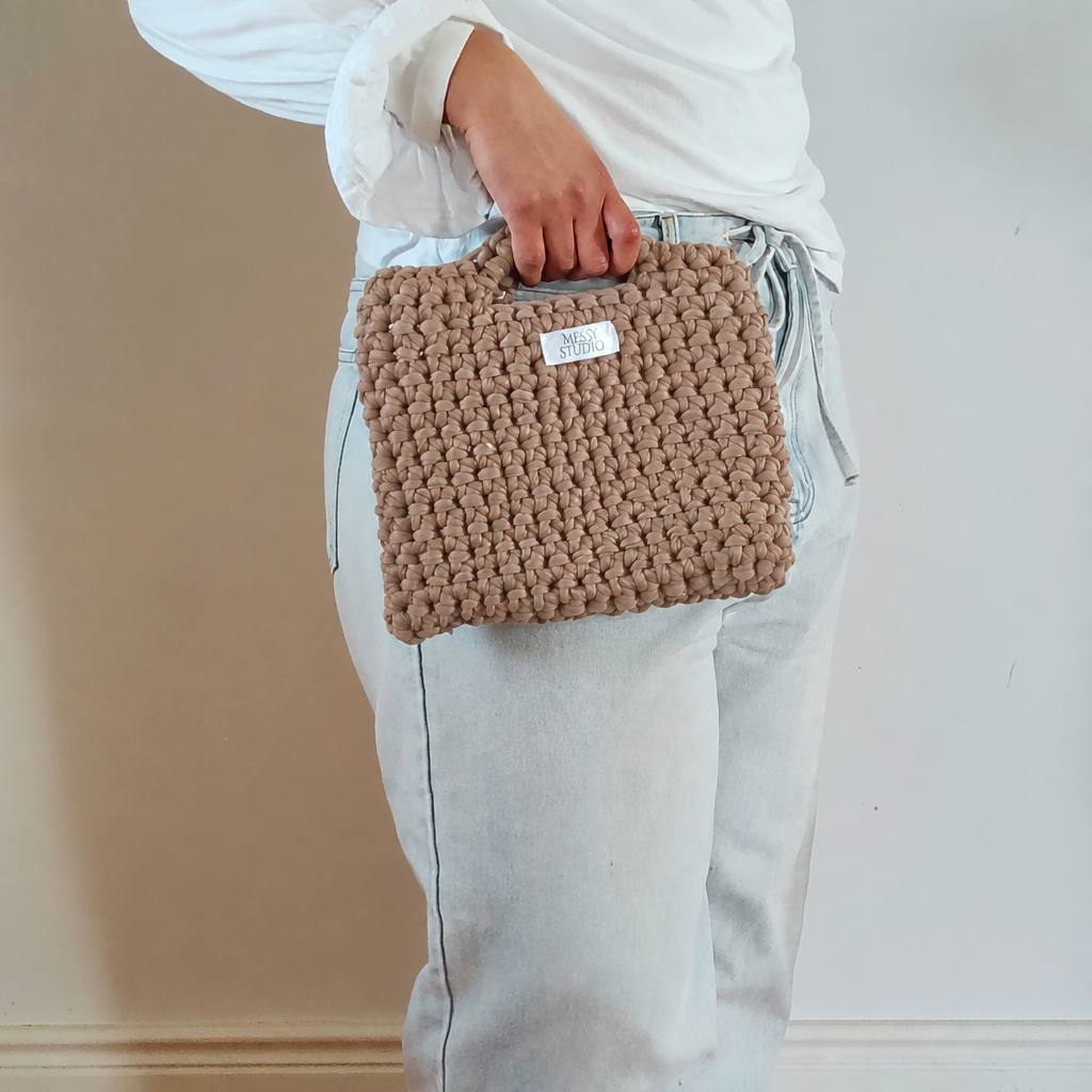 Taupe Studio Norm handheld