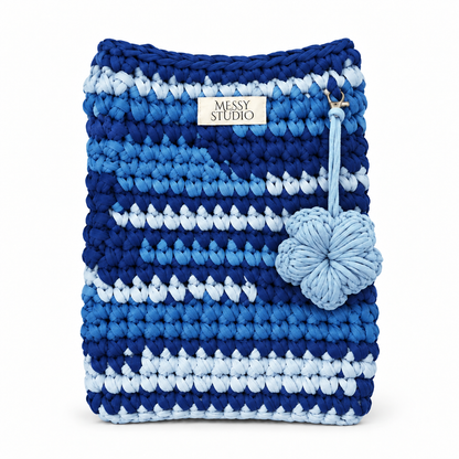 Blue Studio Sleeve with light blue flower charm on a white background